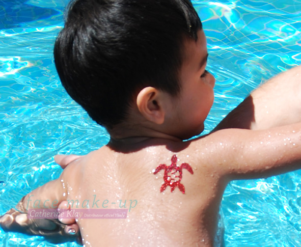 00HOMEPAGE_glitter_tattoos_michel_eshet_0.jpg